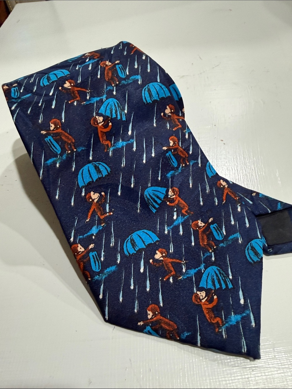 Curious George In The Rain Novelty Navy Tie with Blue Umbrella & Monkey Print